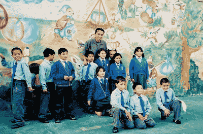 The Children in Bogota wearing uniforms sent by Cullercoats Primary School